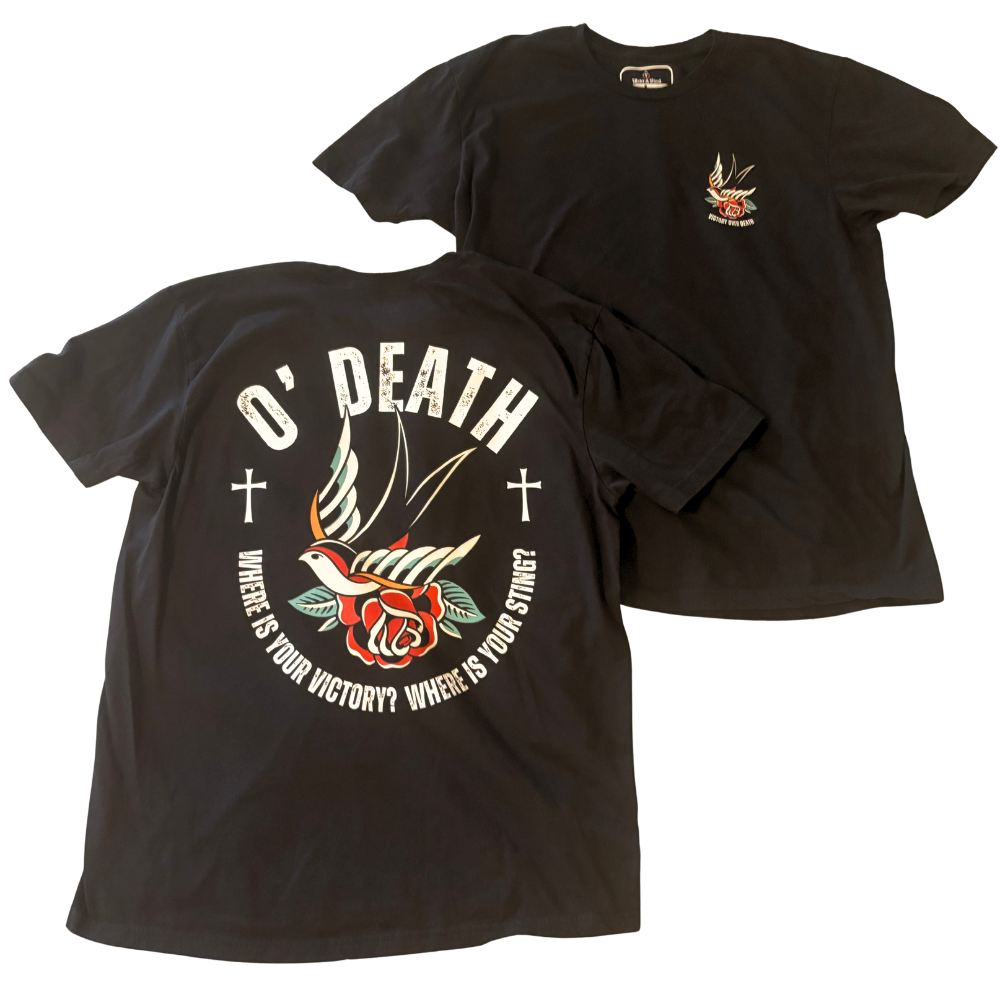Black short-sleeve graphic T-shirt shown from both front and back on a white background. The back features a large white circular 'O' DEATH WHERE IS YOUR VICTORY? WHERE IS YOUR STING?' graphic with a red rose, tattoo-style sparrow, and Christian cross symbols, while the front has a small matching chest graphic with text that reads 'Victory Over Death'