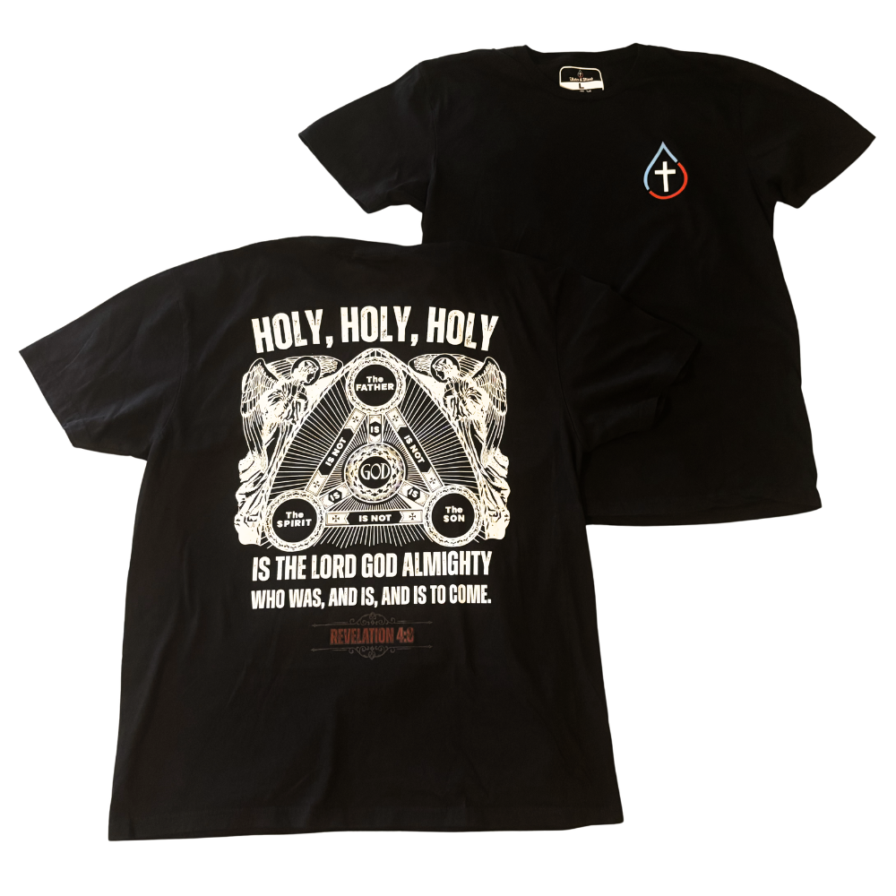 Two black short-sleeve Christian t-shirts shown on a white background, with the front and back views overlapping. The back shirt features a large white graphic with the words 'HOLY, HOLY, HOLY' and a religious design of the Christian Holy Trinity diagram with text and Bible references below.