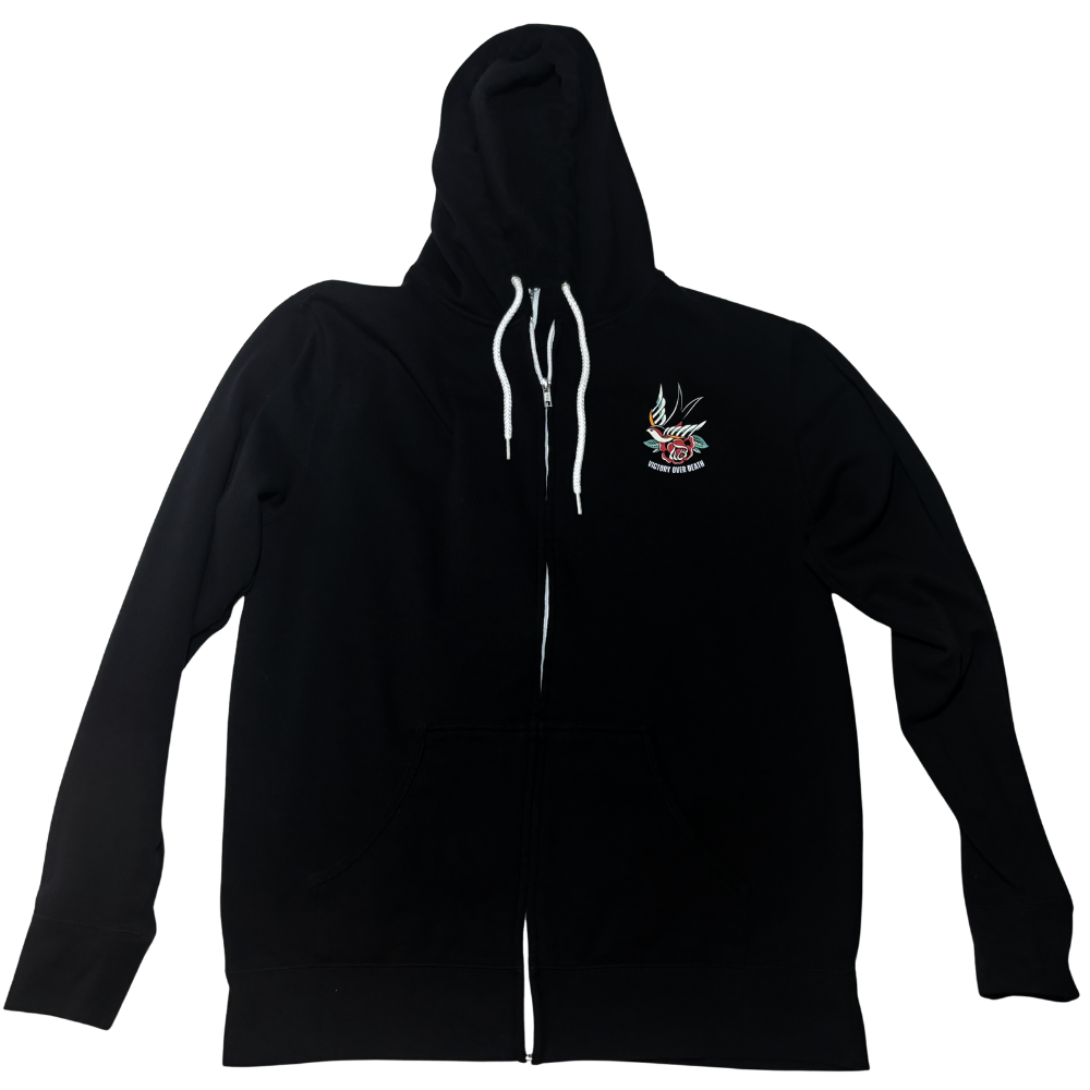 A black zip-up Christian hoodie with white drawstrings and a small graphic on the left chest of a tattoo-style bird and rose over the words 'VICTORY OVER DEATH', displayed against a plain white background.