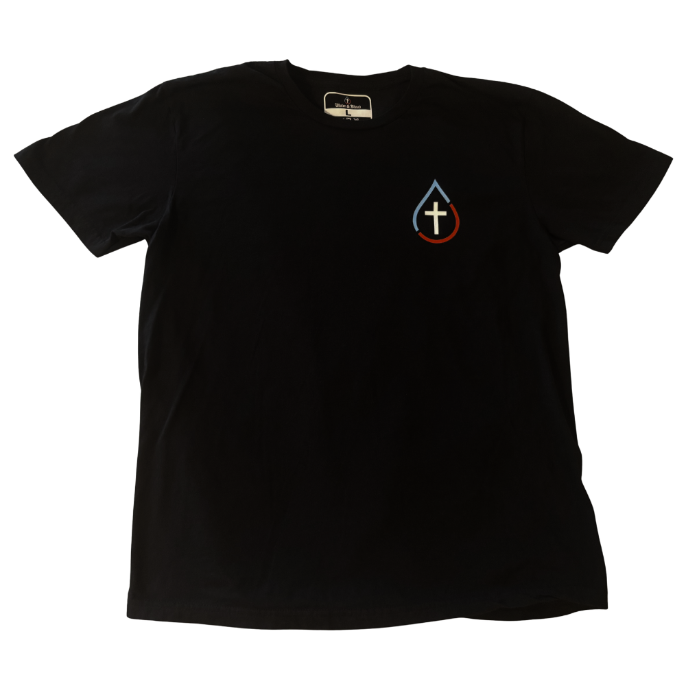 A black short-sleeve Christian t-shirt with a small chest graphic on the wearer's left side. The graphic features a white cross inside a blue and red teardrop shape, set against a plain white background.